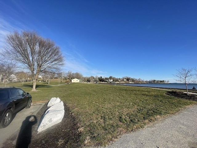 view of yard with a water view