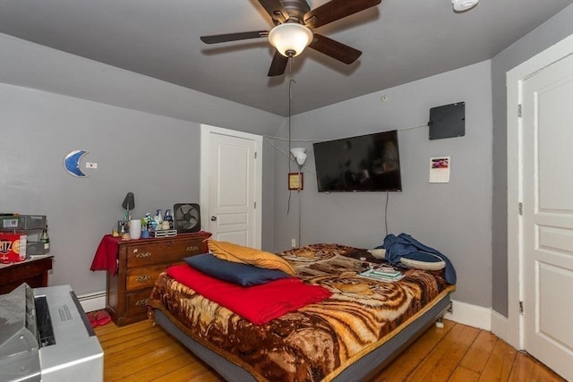 56-A Topliff St, Boston, MA 02122 - bedroom featuring light wood finished floors, ceiling fan, and a baseboard radiator