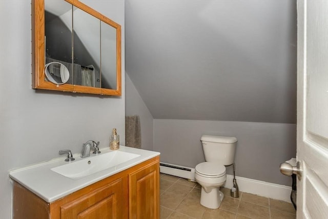 56-A Topliff St, Boston, MA 02122 - bathroom featuring baseboard heating, vanity, vaulted ceiling, and tile patterned floors