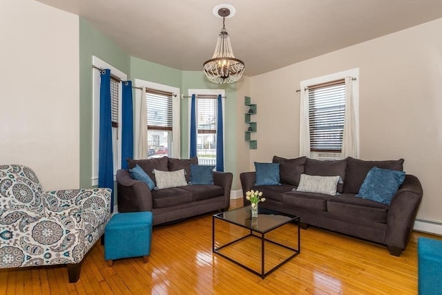 56-A Topliff St, Boston, MA 02122 - living room featuring a chandelier, wood-type flooring, and a baseboard heating unit