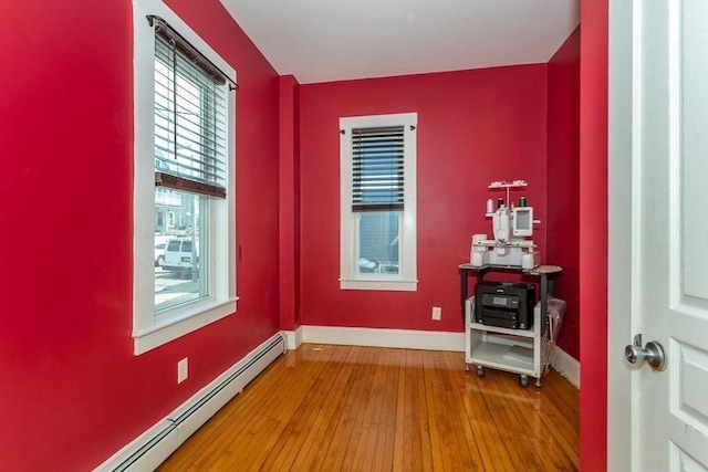 56-A Topliff St, Boston, MA 02122 - unfurnished room featuring baseboard heating and hardwood / wood-style floors