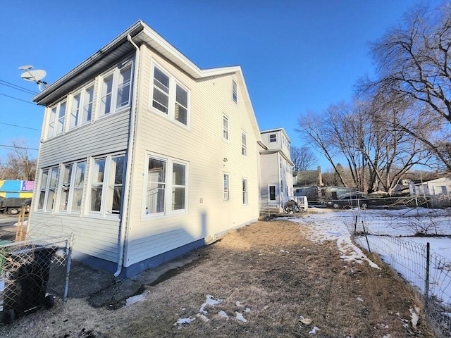 view of snow covered property