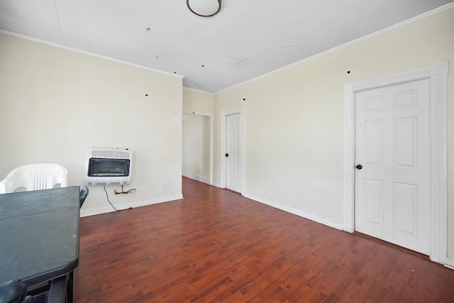 90 Montaup St, Fall River, MA 02724 - living area with heating unit, crown molding, wood finished floors, and baseboards