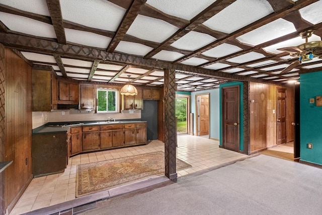 5 Glad St, Freetown, MA 02702 - kitchen with coffered ceiling, ceiling fan, dark countertops, gas cooktop, and wood walls
