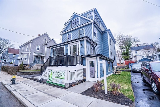 view of front of home with a residential view