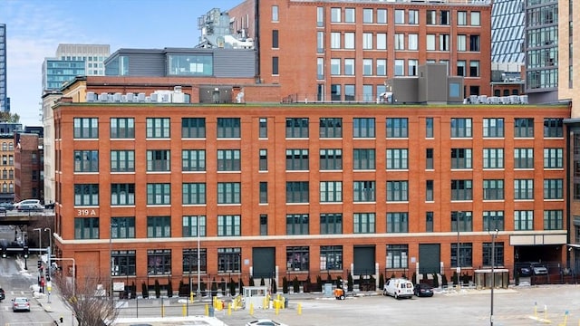 view of building exterior with a city view