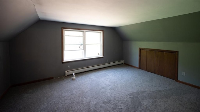 bonus room with baseboards, baseboard heating, carpet flooring, and lofted ceiling