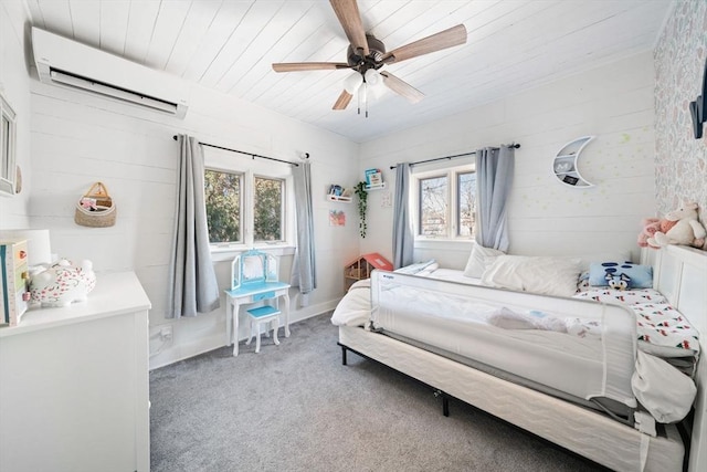 carpeted bedroom featuring ceiling fan, an AC wall unit, and wooden ceiling