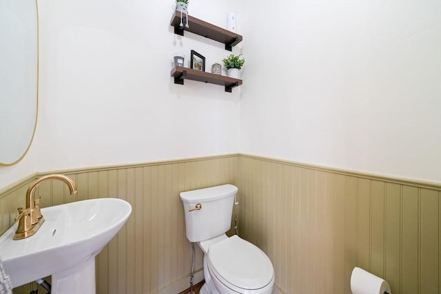 bathroom with sink and toilet