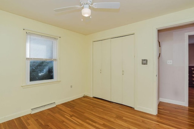 unfurnished bedroom with visible vents, baseboards, and light wood-style floors