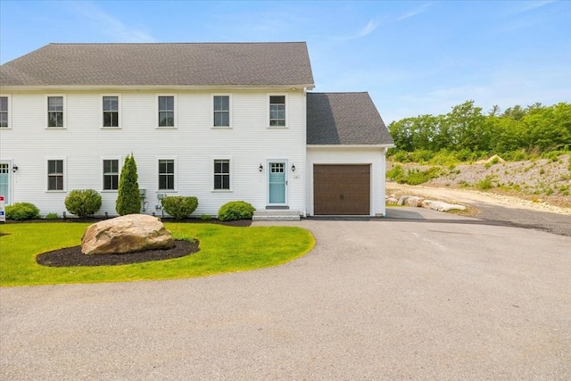 194B Narrows Rd, Westminster, MA 01473 - colonial-style house featuring a garage, asphalt driveway, and a front lawn