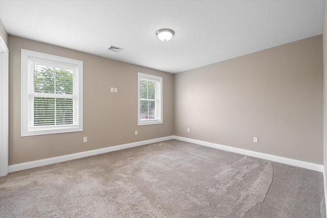 194B Narrows Rd, Westminster, MA 01473 - empty room with plenty of natural light, carpet flooring, and baseboards