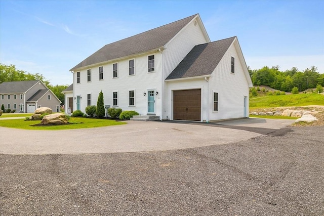 194B Narrows Rd, Westminster, MA 01473 - colonial inspired home with asphalt driveway, an attached garage, and roof with shingles
