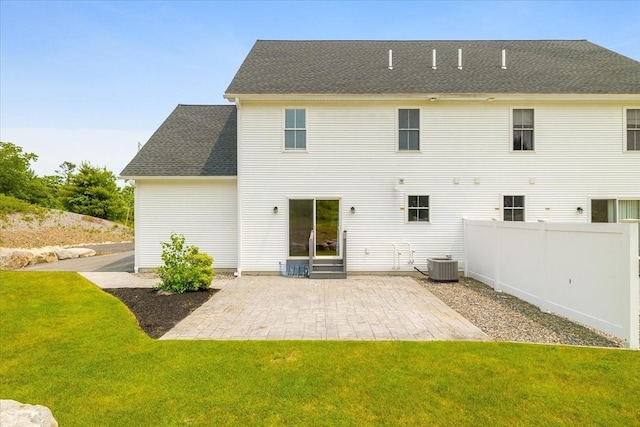 194B Narrows Rd, Westminster, MA 01473 - back of property with a patio, central air condition unit, and a shingled roof