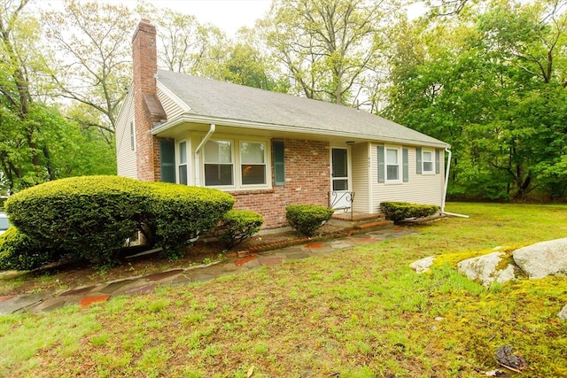 460 Front St, Weymouth, MA 02188 - ranch-style home featuring a chimney, a front lawn, and brick siding