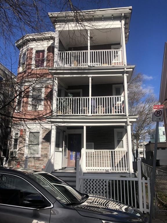 view of front of home with a balcony