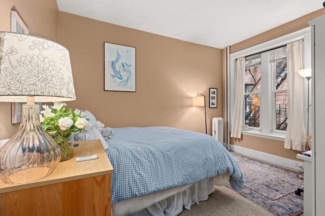 293-295 Commonwealth Ave Unit 3B, Boston, MA 02115 - bedroom with radiator heating unit, carpet, and baseboards