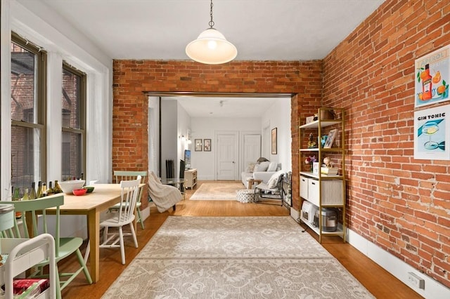 293-295 Commonwealth Ave Unit 3B, Boston, MA 02115 - hall with brick wall, wood finished floors, and baseboards