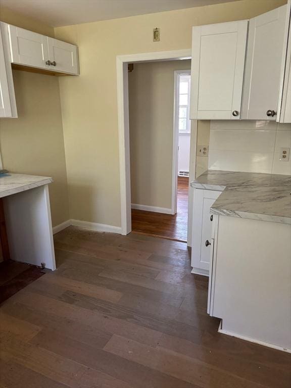 83 Partridge Valley Rd, Yarmouth, MA 02673 - kitchen featuring baseboards, white cabinets, dark wood-style flooring, and light countertops