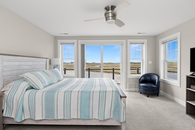 35 Liberty St, Salisbury, MA 01952 - bedroom featuring baseboards, access to exterior, carpet floors, and a ceiling fan