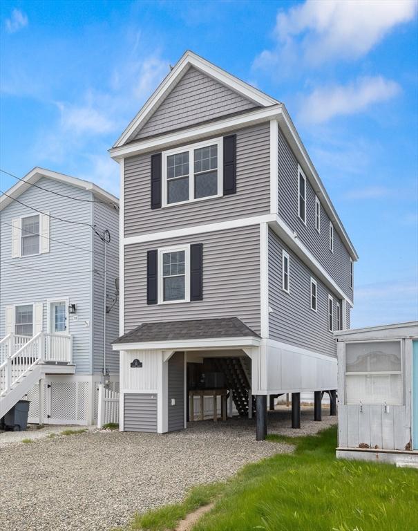 35 Liberty St, Salisbury, MA 01952 - view of front of property with stairway and gravel driveway