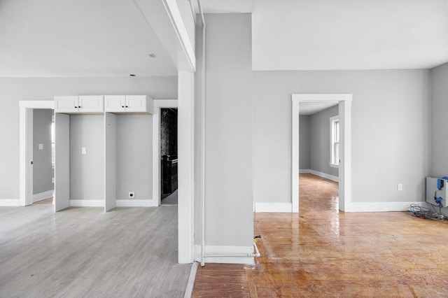 14-18 Florence St, Leominster, MA 01453 - unfurnished living room with light wood finished floors and baseboards