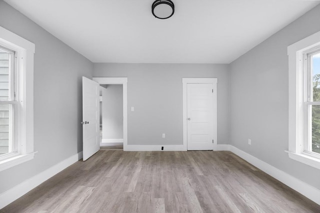 14-18 Florence St, Leominster, MA 01453 - unfurnished bedroom with light wood finished floors and baseboards