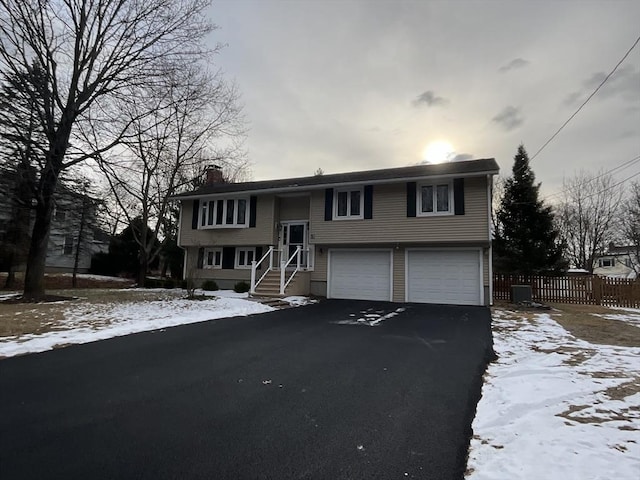 raised ranch with a garage