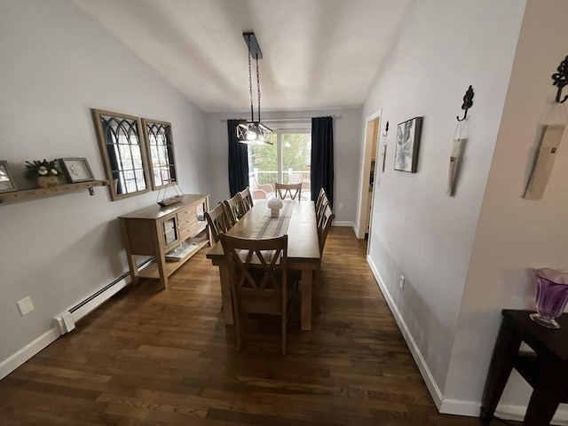 dining space featuring a baseboard radiator, dark hardwood / wood-style flooring, and lofted ceiling