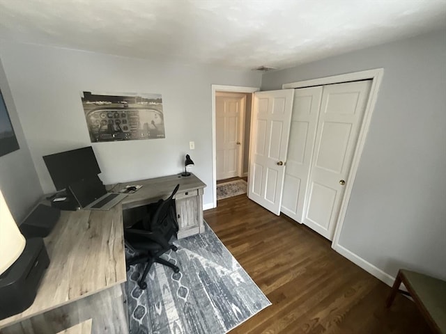 home office featuring dark hardwood / wood-style flooring