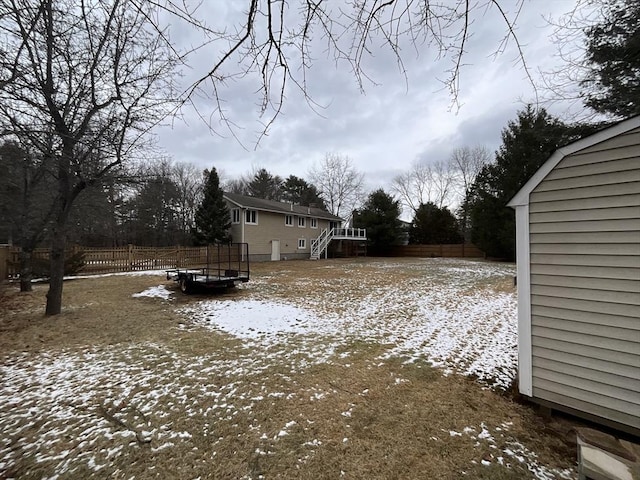 view of yard layered in snow