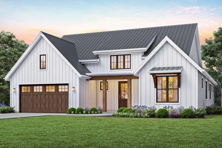 modern inspired farmhouse with a garage and a yard