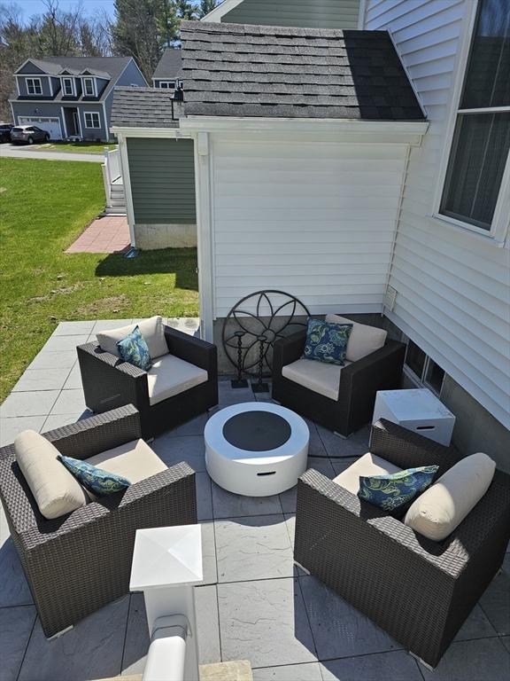 3 Panda Ct Unit 3, Milford, MA 01757 - view of patio / terrace with an outdoor living space with a fire pit