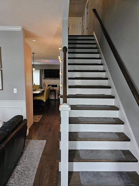 3 Panda Ct Unit 3, Milford, MA 01757 - staircase featuring wood finished floors and attic access