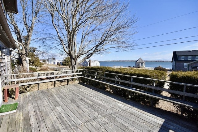 deck featuring a water view