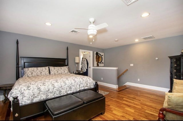 857 Adams St Unit 857, Boston, MA 02124 - bedroom featuring baseboards, wood finished floors, recessed lighting, a ceiling fan, and a spacious closet