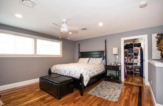 857 Adams St Unit 857, Boston, MA 02124 - bedroom featuring a spacious closet, wood finished floors, a closet, baseboards, and recessed lighting