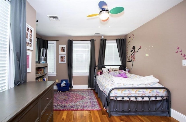 857 Adams St Unit 857, Boston, MA 02124 - bedroom featuring wood finished floors, baseboards, and a ceiling fan