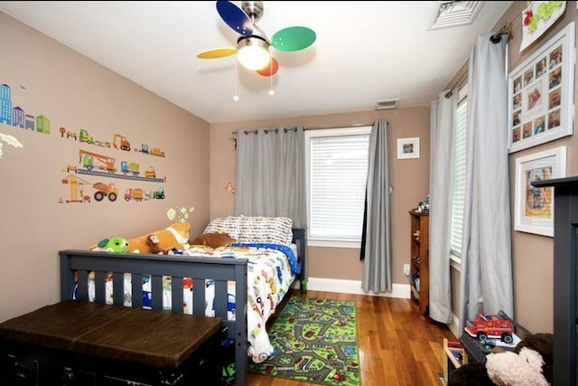 857 Adams St Unit 857, Boston, MA 02124 - bedroom featuring wood finished floors, baseboards, and a ceiling fan