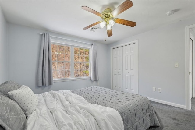 bedroom featuring ceiling fan, carpet flooring, and a closet