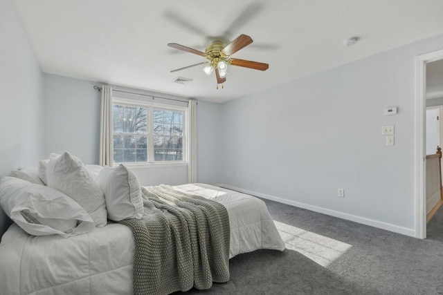 carpeted bedroom with ceiling fan