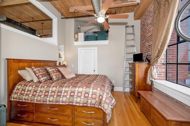 bedroom with beam ceiling, ceiling fan, wood ceiling, and light wood-type flooring