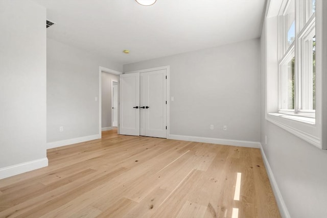 2 Suncrest Ave, Wilmington, MA 01887 - empty room featuring baseboards and light wood-style flooring