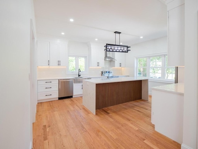 28 Berkshire Ave, Sharon, MA 02067 - kitchen featuring stainless steel appliances, healthy amount of natural light, decorative backsplash, white cabinetry, and recessed lighting