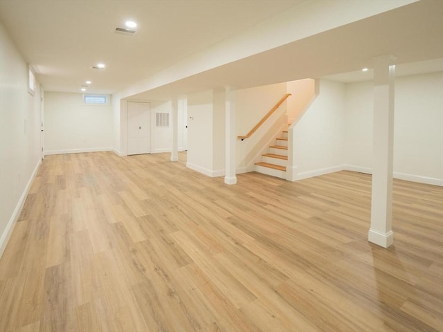 28 Berkshire Ave, Sharon, MA 02067 - finished basement featuring light wood finished floors, stairway, and recessed lighting