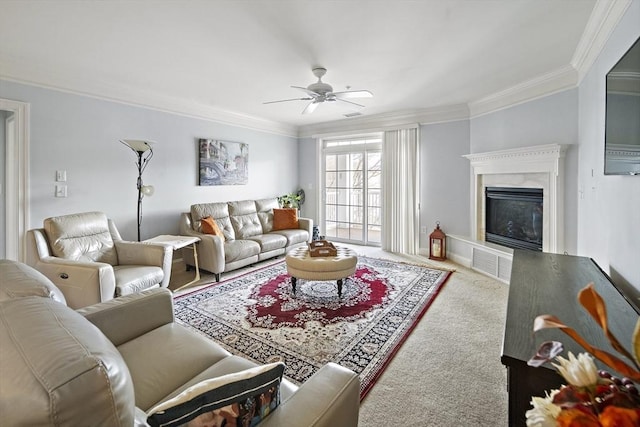 carpeted living room with ceiling fan and crown molding