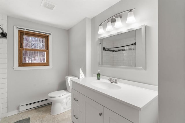 bathroom with visible vents, tiled shower, toilet, baseboard heating, and vanity