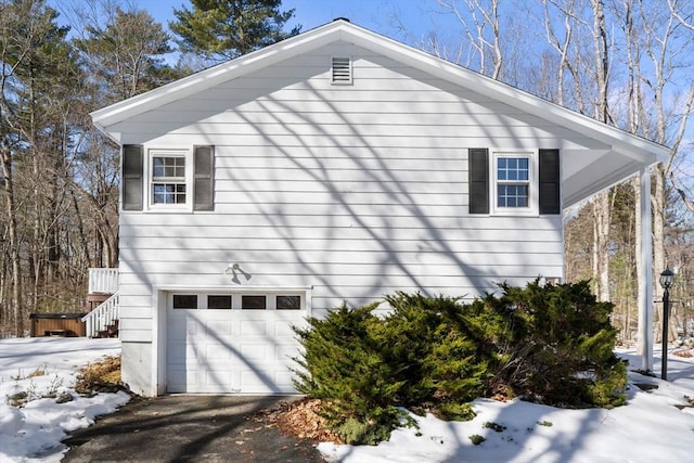 view of home's exterior with an attached garage