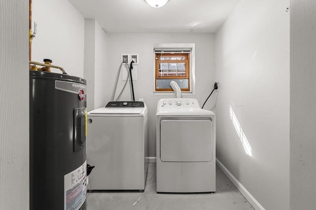 washroom with laundry area, washer and clothes dryer, electric water heater, and baseboards