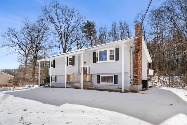 bi-level home with a chimney